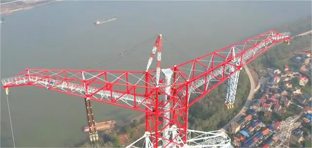 Transformatio per Yangtze: Wuhan-Nanchang High-Voltage Power Line Soars to New heights